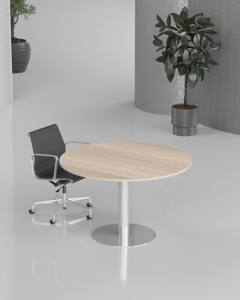 Modern oak finish round meeting table in a bright corporate office conference room