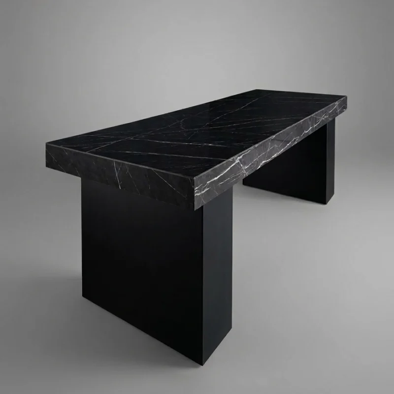 Kamio executive desk Dubai with thick black marble-look top and solid block legs in a glass office